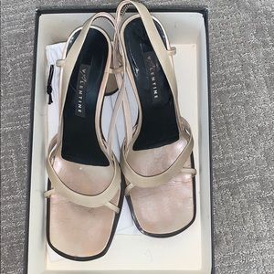 Cream open toed heels